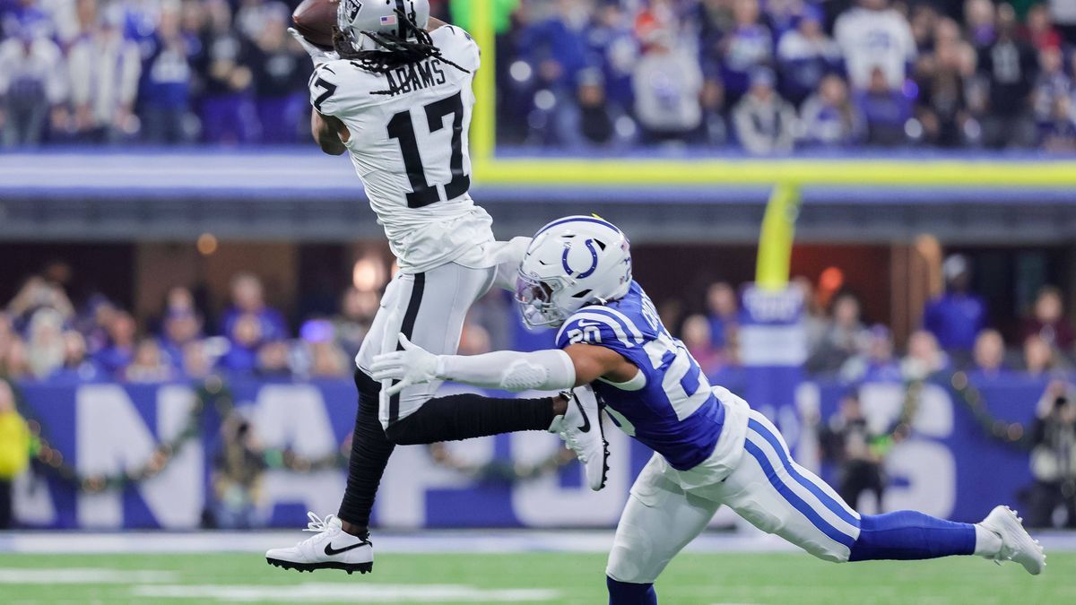 December 31, 2023, Indianapolis, Indiana, U.S: Las Vegas Raiders wide receiver Davante Adams (17) goes up for a catch in front of Indianapolis Colts safety Nick Cross (20) during the game between t...
