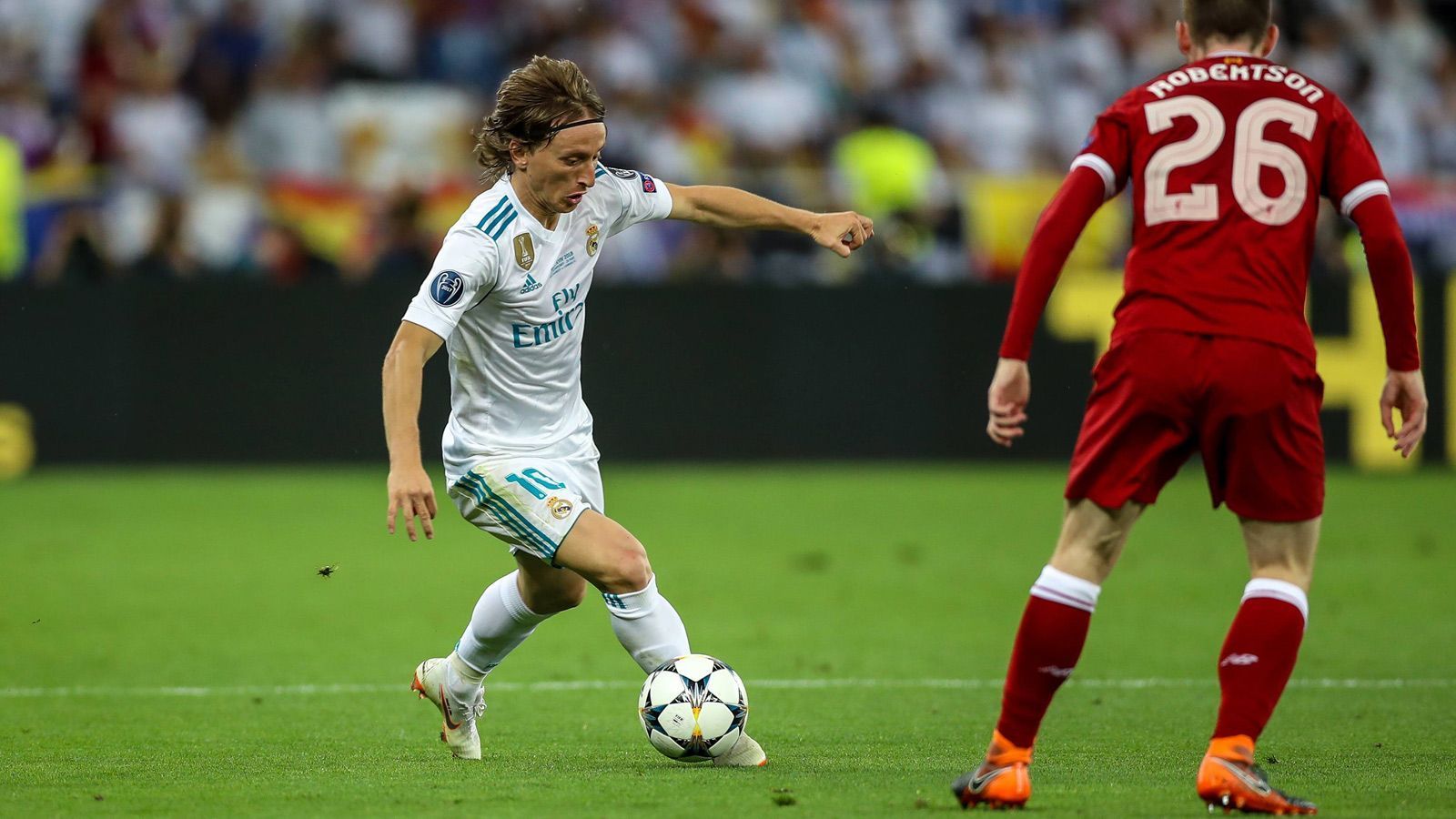 
                <strong>Luka Modric (Real Madrid)</strong><br>
                Zu Beginn ist der kleine Kroate mehr als Schussblocker in der Abwehr als in seiner eigentlichen Funktion als Antreiber gefordert. Mit zunehmender Spieldauer gewinnt er aber an Sicherheit und verhilft Real damit für ein Übergewicht im Mittelfeld. ran-Note: 3
              