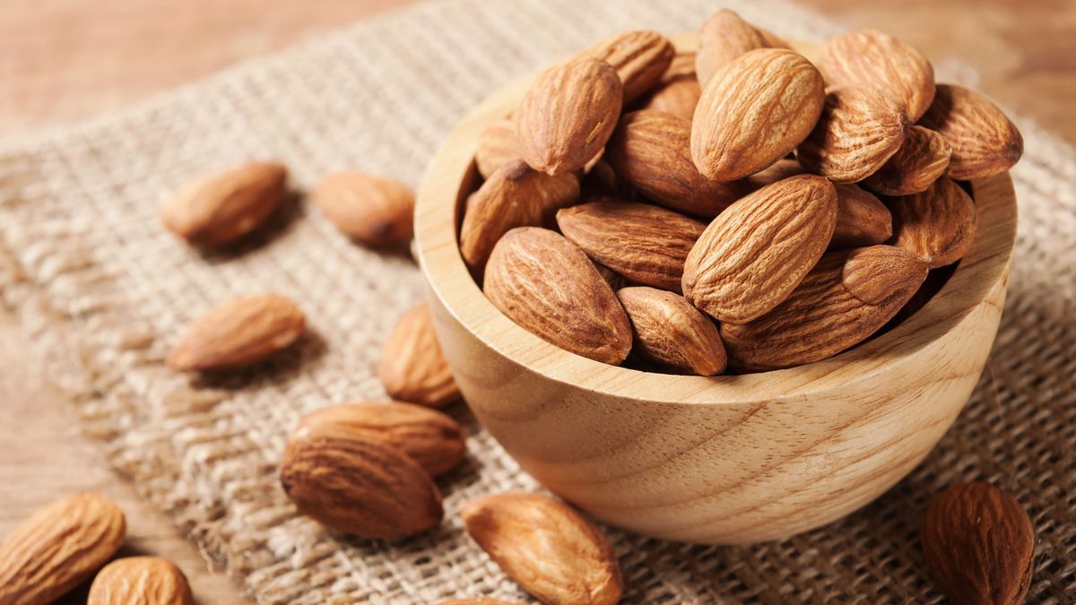 Almond snack fruit in wooden bowl