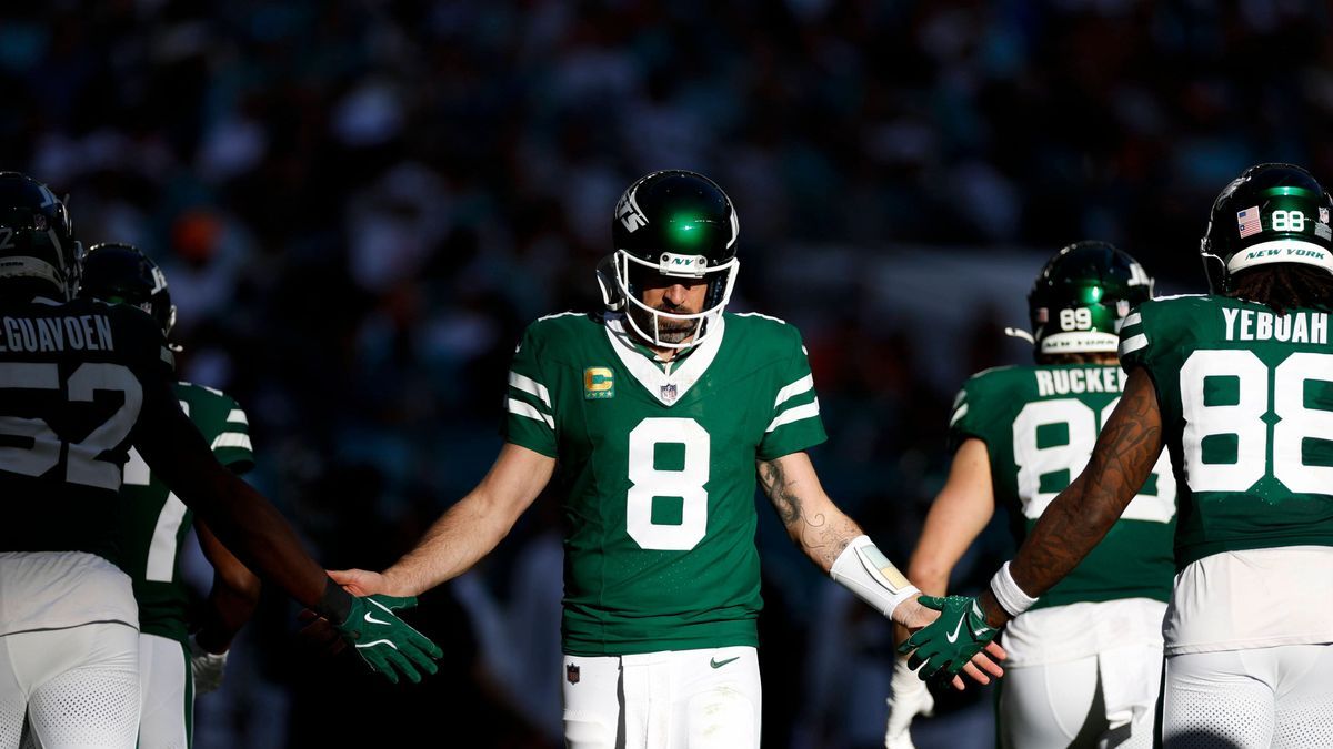 MIAMI GARDENS, FL - DECEMBER 08: New York Jets quarterback Aaron Rodgers (8) greets teammates during the game between the Miami Dolphins and the New York Jets on December 8, 2024 at Hard Rock Stadi...