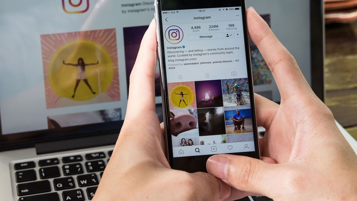 CHIANG MAI, THAILAND - JUNE 24, 2017: A man hand holding iphone with new logo of instagram application. Instagram is largest and most popular photograph social networking.