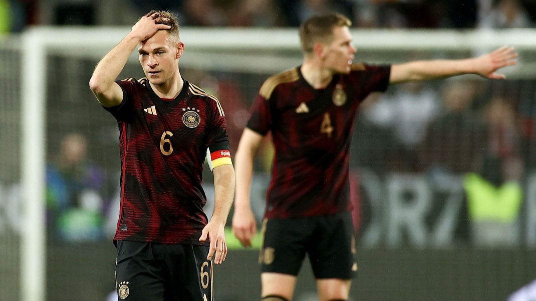 Joshua Kimmich (l) und Matthias Ginter beim Spiel gegen Belgien.