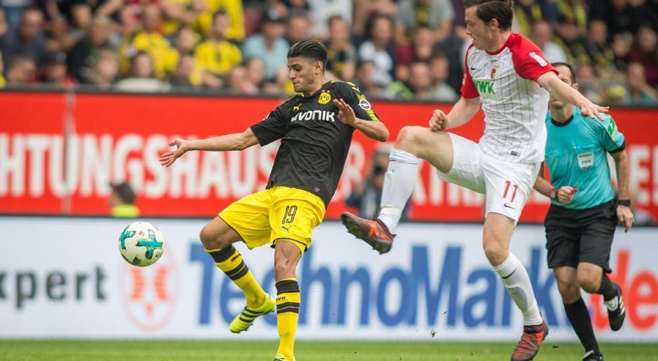 
                <strong>Mahmoud Dahoud</strong><br>
                Größtenteils mit einem unauffälligen Spiel ohne Fehler - für einen Sechser kein schlechtes Zeugnis. Meist im Bereich des Mittelkreises zu finden, kurz vor der Pause auch in der Offensive mit dabei, Dahouds Flachschuss pariert Hitz gut. Ackert, kämpft, holt sich viele Bälle von den bissigen Augsburgern. Nach 56 Minuten ist Dahouds Arbeitstag beendet, für ihn kommt Castro. ran-Note: 3
              