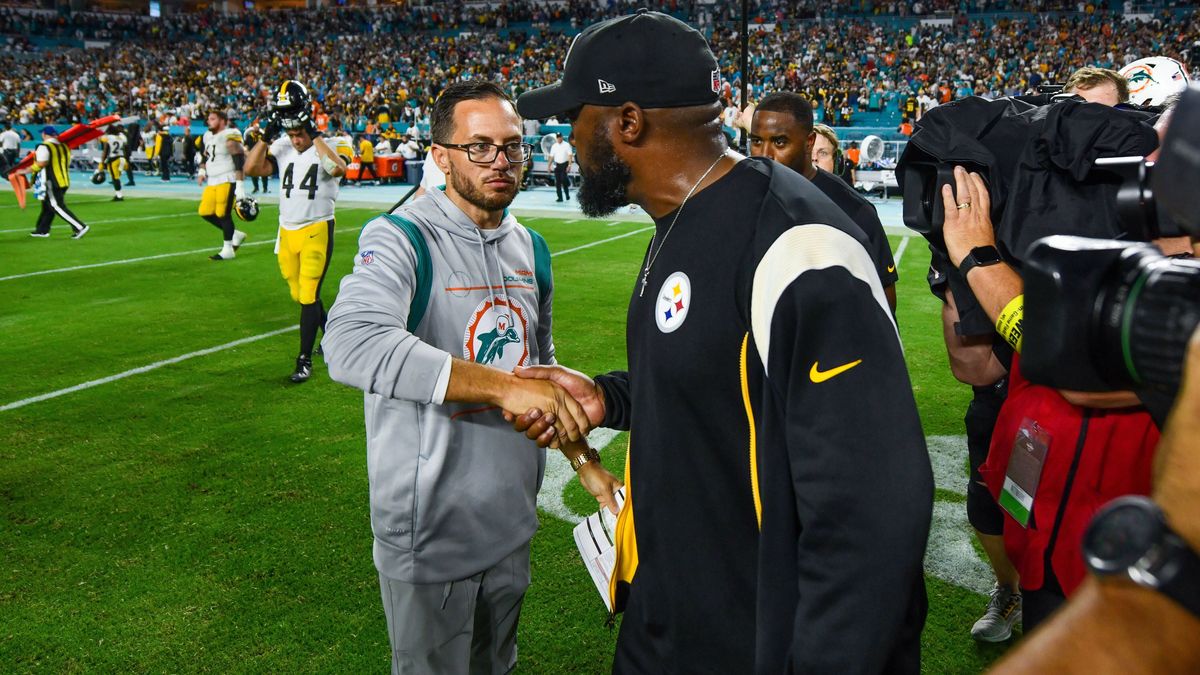 October 23, 2022, Miami Gardens, Florida, USA: October 23rd, 2022 Miami Dolphins head coach Mike McDaniel and Pittsburgh Steelers head coach Mike Tomlin shake hands during postgame at Pittsburgh St...