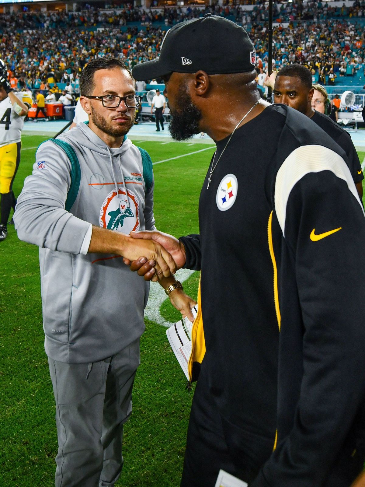 October 23, 2022, Miami Gardens, Florida, USA: October 23rd, 2022 Miami Dolphins head coach Mike McDaniel and Pittsburgh Steelers head coach Mike Tomlin shake hands during postgame at Pittsburgh St...