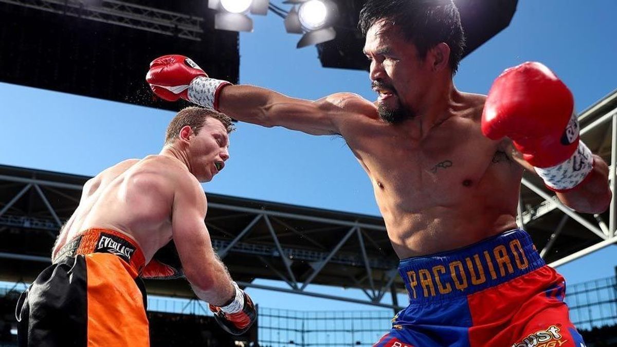 Manny Pacquiao (re.) wurde in acht Gewichtsklassen Weltmeister