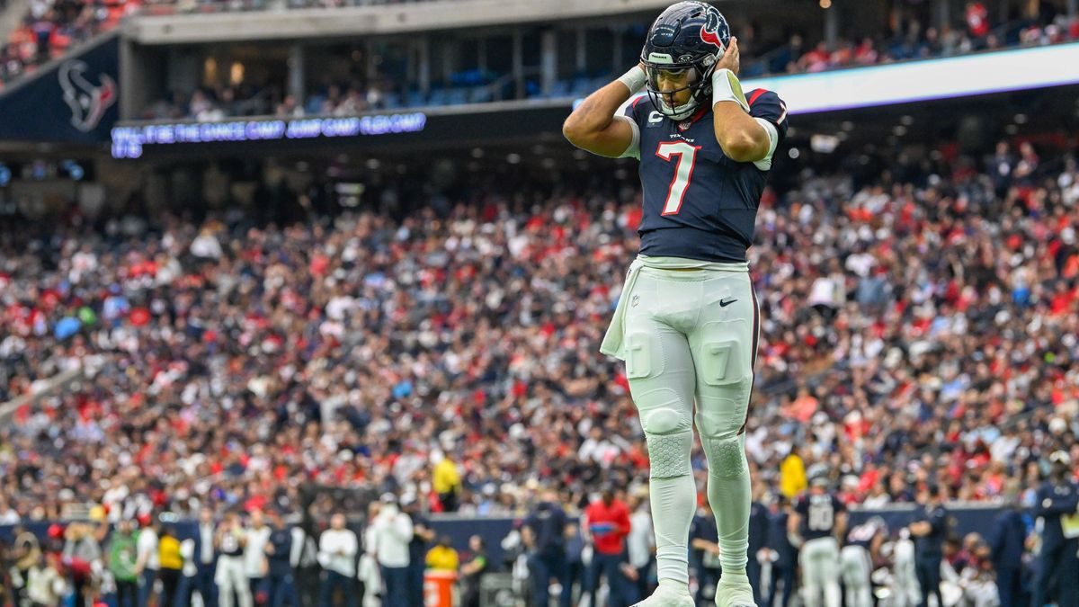 HOUSTON, TX - DECEMBER 31: Houston Texans quarterback C.J. Stroud (7) listens to a play call in his helmet from the sideline during the football game between the Tennessee Titans and Houston Texans...