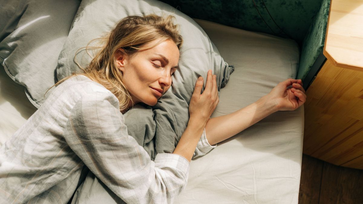 Young caucasian woman is sleeping. The concept of a healthy daytime sleep.