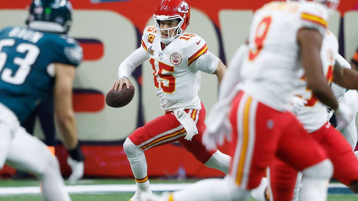 Kansas City Chiefs quarterback Patrick Mahomes scrambles out of the pocket in the third quarter against the Philadelphia Eagles before the Eagles defeat the Kansas City Chiefs 40-22 in Super Bowl L...