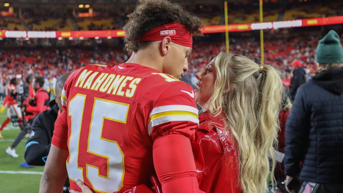 KANSAS CITY, MO - DECEMBER 08: Kansas City Chiefs quarterback Patrick Mahomes (15) and wife Brittany Mahomes hug before an NFL, American Football Herren, USA game between the Los Angeles Chargers a...