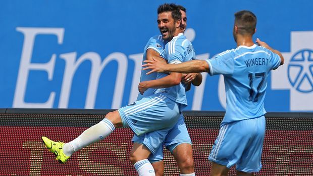 
                <strong>David Villa (New York City)</strong><br>
                David Villa (New York City): Der Stürmer verbringt den Großteil seiner Karriere in der Primera Division - unter anderem bei Atletico Madrid, dem FC Valencia und dem FC Barcelona. Der mittlerweile 34-Jährige entscheidet sich 2014 für einen Wechsel zum New York City FC. Für den seit 2013 bestehenden Klub markiert der Spanier 2015 18 Saisontreffer. Vier Tore sind es in der laufenden MLS-Saison 2016.
              