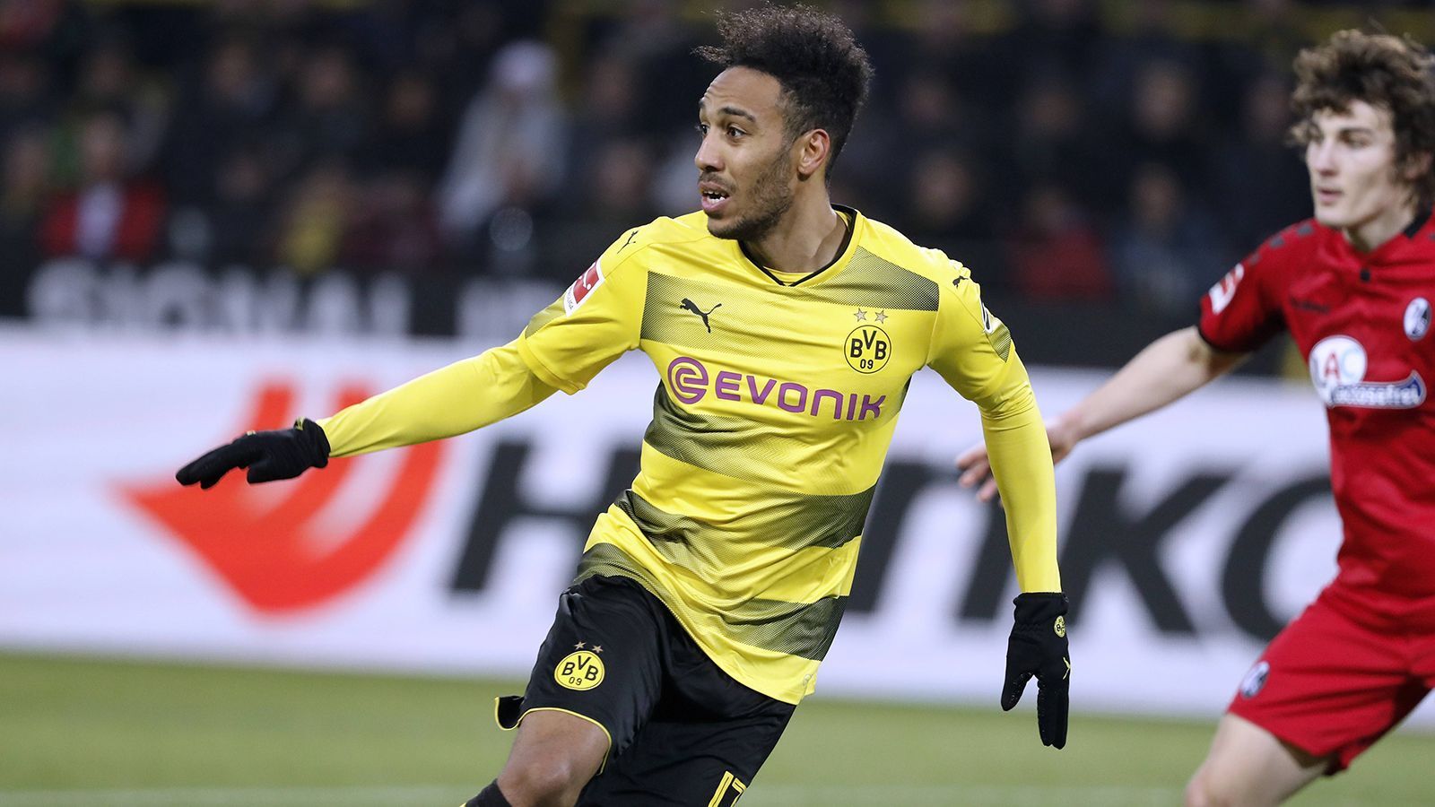 
                <strong>Platz 4: Pierre-Emerick Aubameyang </strong><br>
                &#x2022; Gekauft für: 13 Millionen Euro<br>&#x2022; Verkauft für: 63,75 Millionen Euro<br>&#x2022; <strong>Transfergewinn: 50,75 Millionen Euro</strong><br>&#x2022; Wechsel zu: FC Arsenal (2018)<br>
              