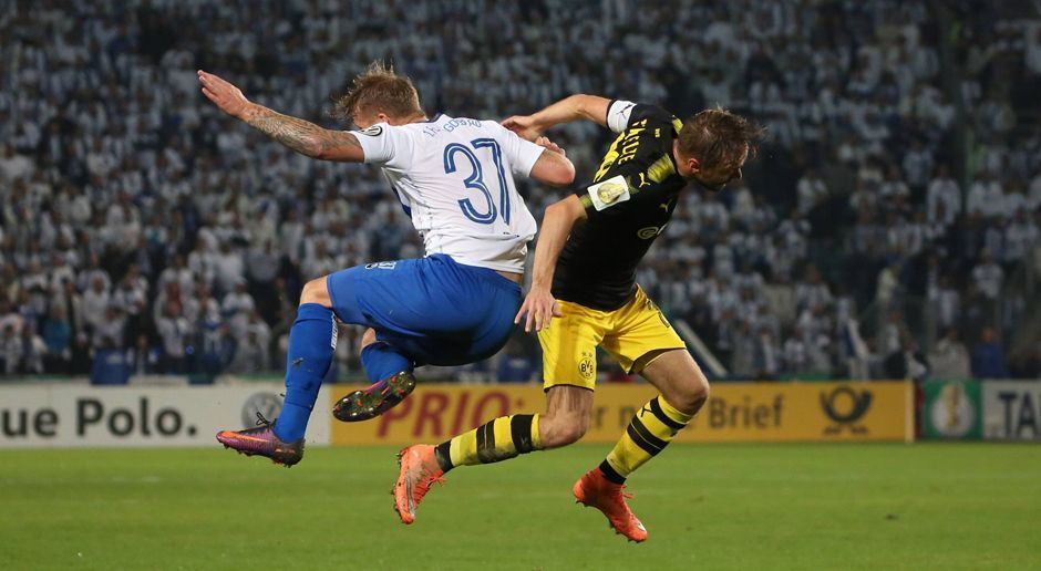 
                <strong>Marcel Schmelzer</strong><br>
                Vor allem zu Beginn ist Schmelzer das Bemühen anzusehen, gegen seinen Jugendklub aufzutrumpfen. Schmelzer lässt sich oft vorne blicken, steuert aber letztlich nichts Zählbares bei. In der 63. Minute verlässt der Kapitän für Raphael Guerreiro den Platz. ran-Note: 3
              