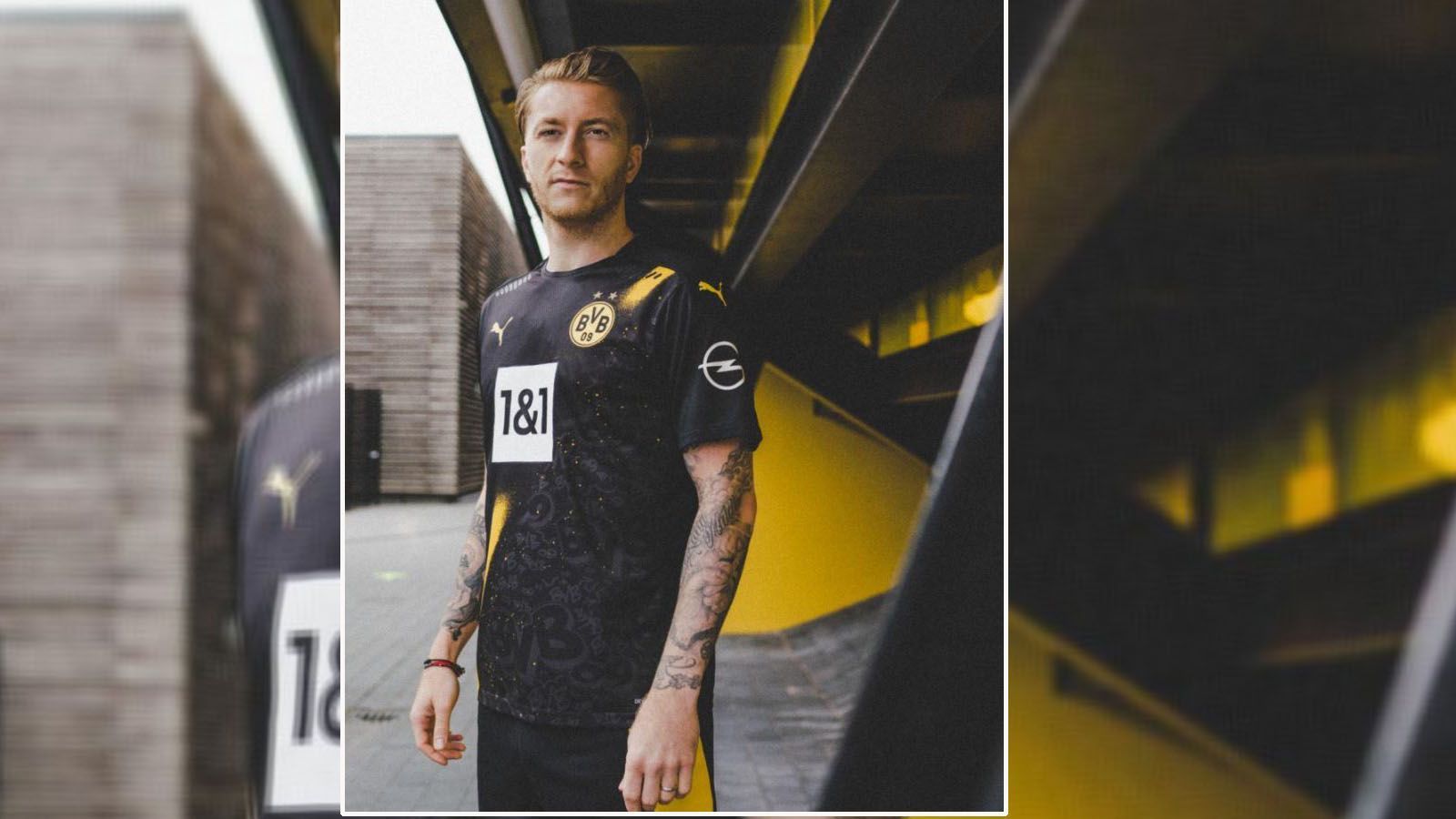 
                <strong>Borussia Dortmund (Auswärtstrikot Bundesliga 2020/21)</strong><br>
                Borussia Dortmund hat nun auch sein Auswärtstrikot für die kommende Bundesliga-Saison präsentiert. Hierbei dominiert die Farbe schwarz. Schräg über das Trikot geht ein gelber Streifen. Während die davon getrennte rechte Seite (aus Spielersicht) abgesehen vom gelben Puma-Logo komplett schwarz ist, finden sich auf der linken Seite mehrere BVB-Schriftzüge. So finden sich dabei bekannte Graffiti-Motive der Stadt wieder und es soll eine Hommage an die Fankultur sein. Anders als im internationalen Wettbewerb werden die Dortmunder in der Bundesliga mit dem Logo des Internetanbieters "1&1" auf der Brust auflaufen.
              