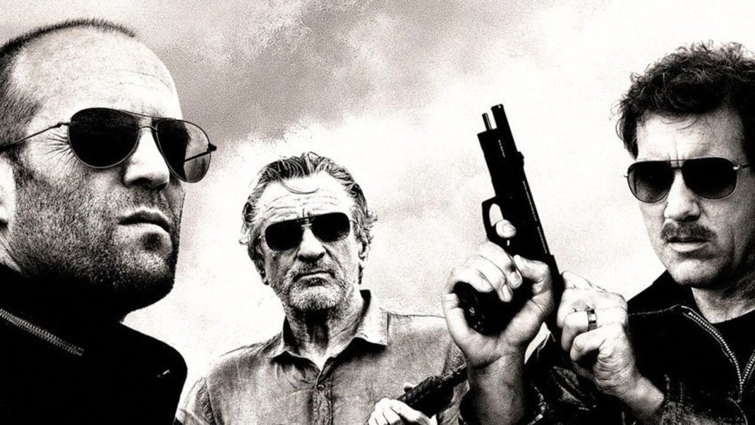 Jason Statham, Robert De Niro und Clive Owen (v. l.) spielen im Film "Killer Elite" mit.