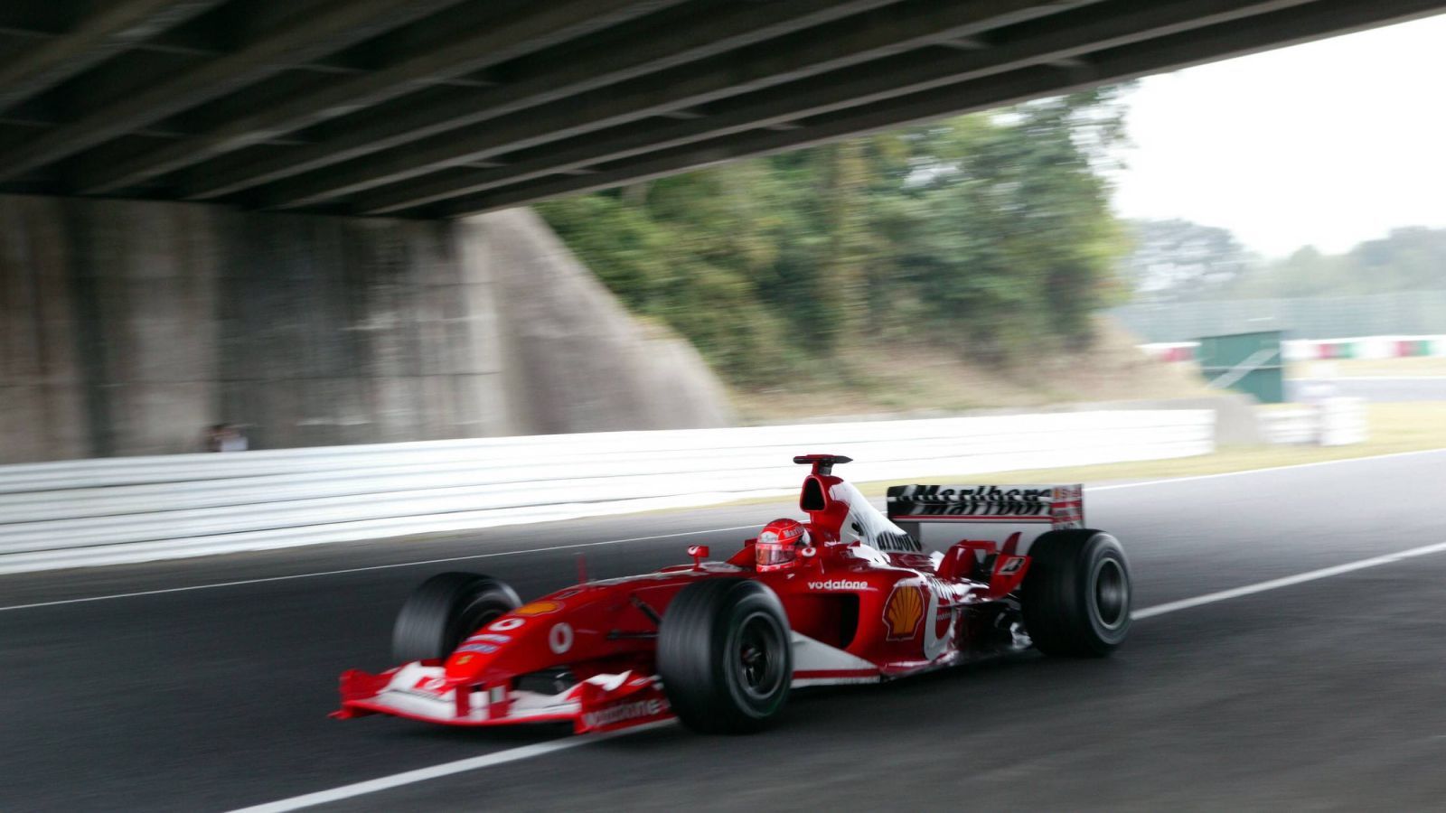 
                <strong>Michael Schumacher wird zum sechsten Mal Weltmeister</strong><br>
                Die Formel 1-Saison 2003 wird im Oktober entschieden. Beim Großen Preis von Japan in Suzuka reicht Michael Schumacher ein achter Platz und damit ein Meisterschaftspunkt um seinen sechsten Fahrer-Titel in der Königsklasse des Motorsports perfekt zu machen.
              