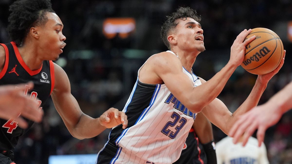 January 3, 2025, Toronto, On, Canada: Orlando Magic forward Tristan da Silva (23) drives to the net as Toronto Raptors forward Scottie Barnes (4) defends during second half NBA, Basketball Herren, ...