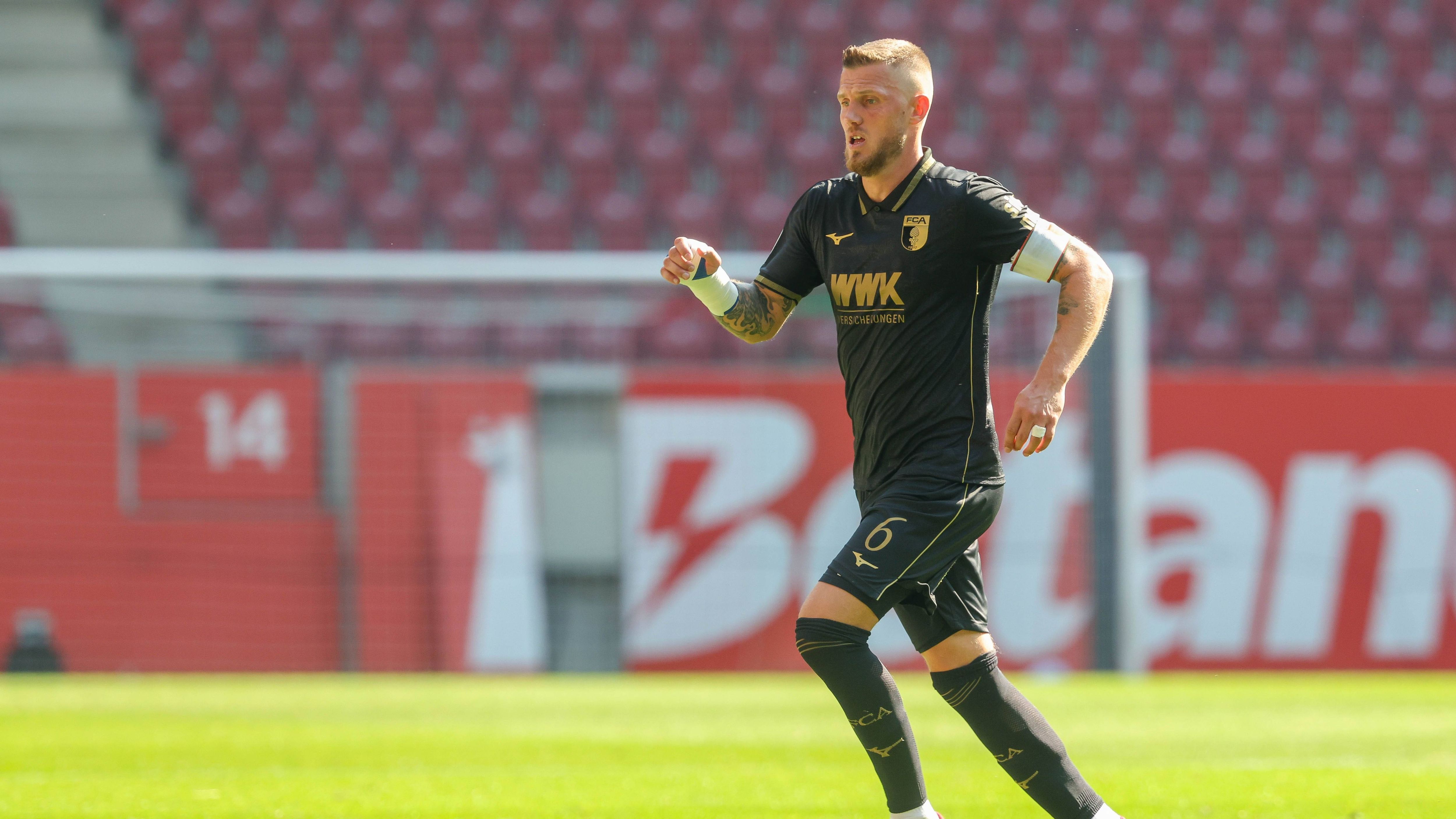 <strong>FC Augsburg:</strong>&nbsp;<strong>Jeffrey Gouweleeuw</strong><br>Kapitän seit Sommer 2024.