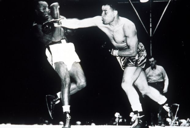 
                <strong>Joe Louis</strong><br>
                27. Juni 1948: Joe Louis schlägt Jersey Joe Walcott in New York durch K.o. in der elften Runde. Das "Ring Magazine" sieht Louis als besten Puncher der Geschichte. Der Schwergewichtler war mit 25 Titelverteidigungen in Folge der am längsten amtierende Weltmeister.
              