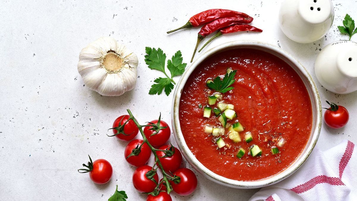 Gazpacho - traditional spanish cold  soup with cucumber and garlic. Top view with copy space.