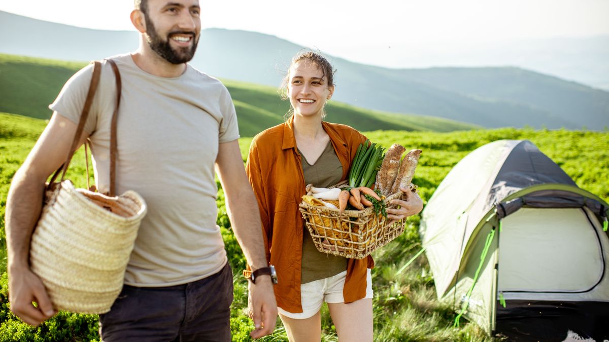 Young couple traveling in the mountains