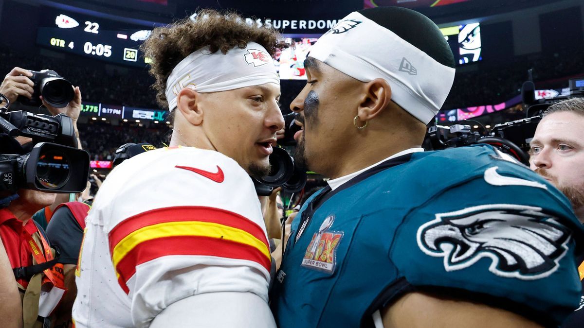 Philadelphia Eagles quarterback Jalen Hurts and Kansas City Chiefs quarterback Patrick Mahomes meet on the field after the Eagles defeat the Kansas City Chiefs 40-22 in Super Bowl LIX at Caesars Su...