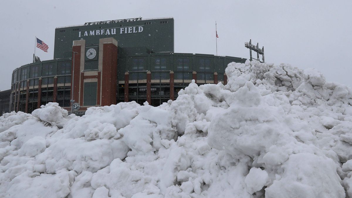 Syndication: Green Bay Press-Gazette Snow is seen piled up on Wednesday, April 3, 2024, at Lambeau Field in Green Bay, Wis. A winter storm system that began on Tuesday is expected to drop 8-12 inch...