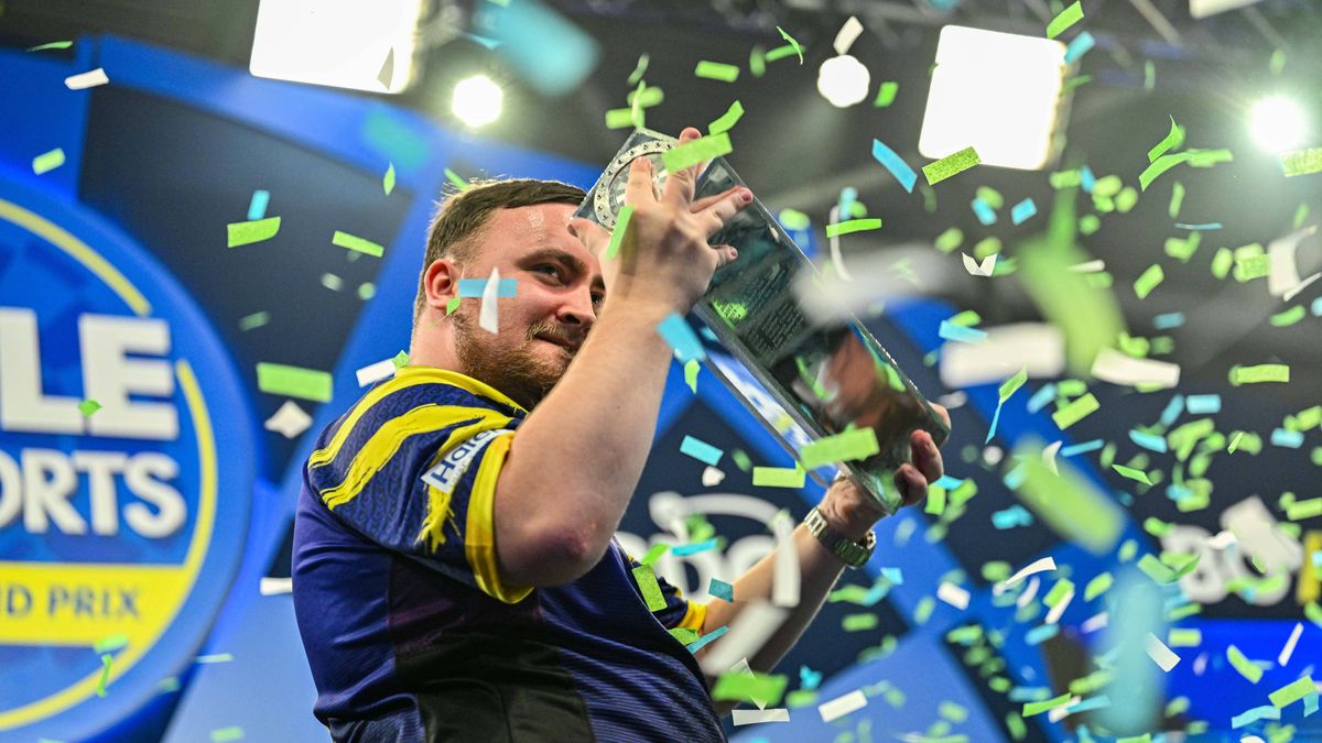 12th October 2025; Mattioli Arena, Leicester Leicestershire, England; 2025 PDC Boyle Sports World Grand Prix Darts Final Night; Luke Littler holds the trophy after his victory over Luke Humphries i...