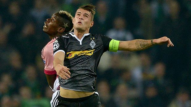 
                <strong>Granit Xhaka</strong><br>
                Granit Xhaka: Unauffälliger als Nebenmann Dahoud. Aber der Kapitän war in diesem Spiel für andere Dinge zuständig: Zweikämpfe gewinnen, Bälle holen, dirigieren. Das machte er gut. Suchte in Überzahl auch selbst den Abschluss. ran-Note: 2-
              