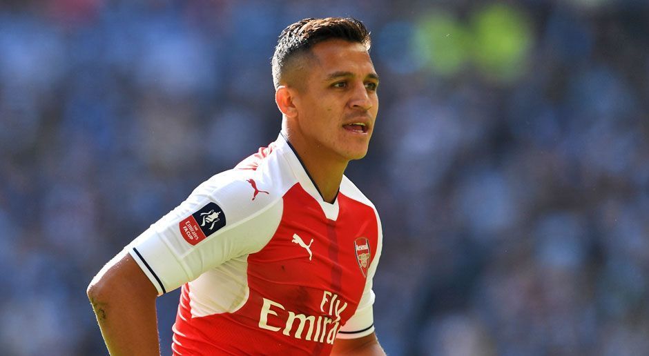 
                <strong>Alexis Sanchez</strong><br>
                Alexis Sanchez (FC Arsenal): Weil auf der Sturm-Position wohl dringend nach einem neuen Top-Torjäger gesucht wird, soll PSG mit Alexis Sanchez noch einen dritten Namen auf dem Zettel haben. Keine große Überraschung - zahlreiche Klubs aus Europa wie auch der FC Bayern München machen offenbar Jagd auf den Chilenen. Doch auch die "Gunners" haben eine Zukunft von Sanchez in London noch nicht abgeschrieben und sollen an einer Vertragsverlängerung des 28-Jährigen arbeiten.
              