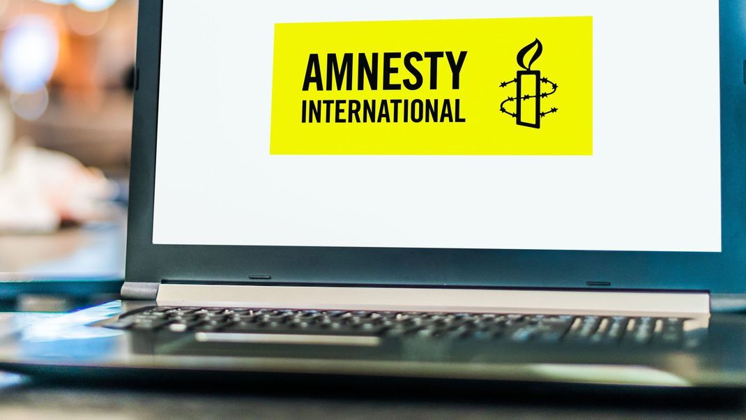 Laptop computer displaying logo of Amnesty International