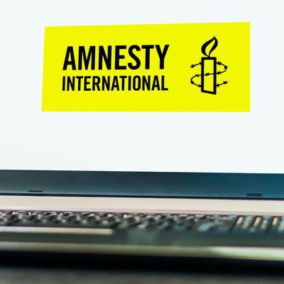 Laptop computer displaying logo of Amnesty International