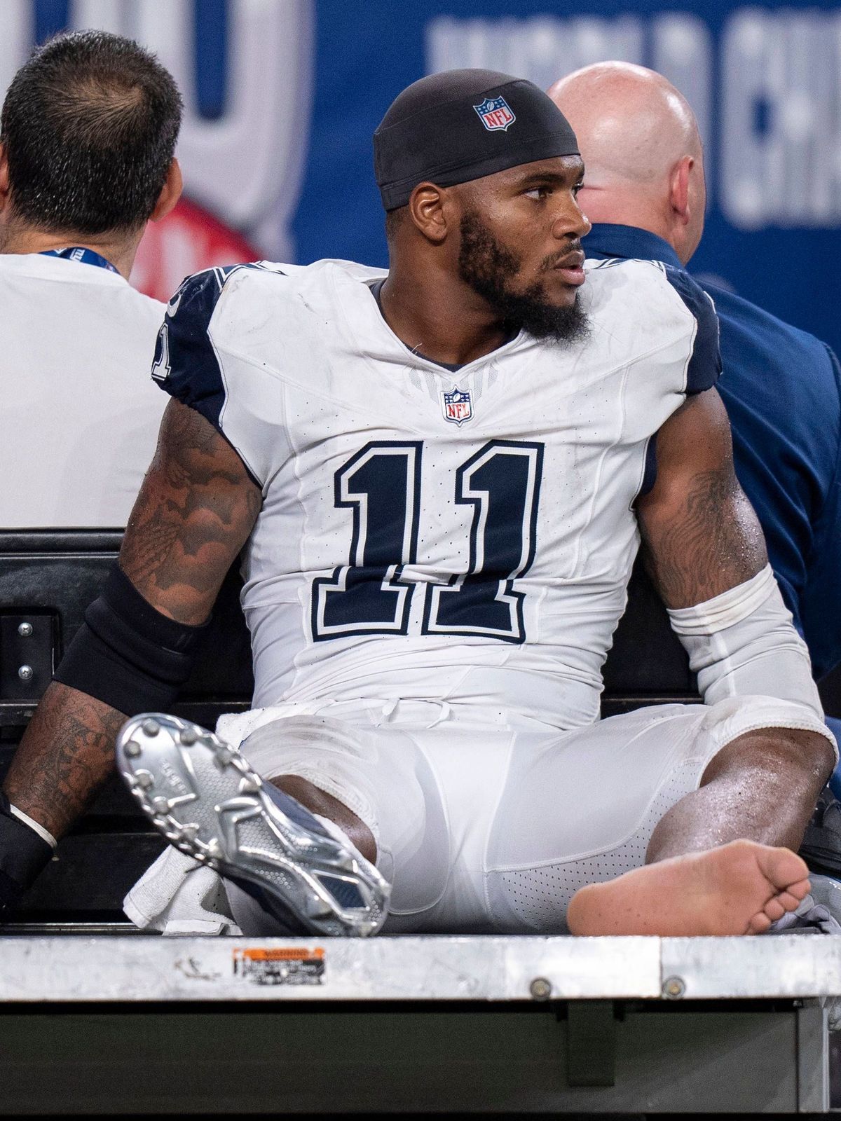 Dallas Cowboys linebacker Micah Parsons (11) looks on as he is carted off the field during the NFL, American Football Herren, USA football game against the New York Giants, Thursday, Sept. 26, 2024...