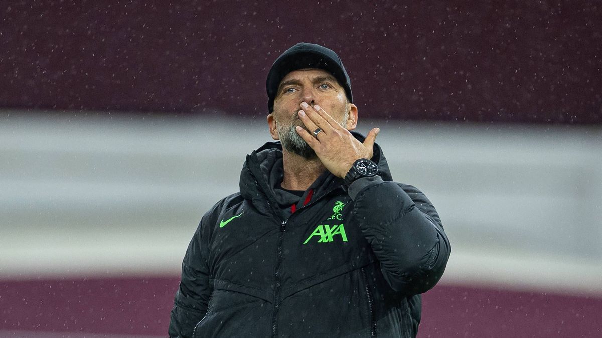 Football - FA Premier League - Aston Villa FC v Liverpool FC BIRMINGHAM, ENGLAND - Monday, May 13, 2024: Liverpool s manager Jürgen Klopp kisses goodbye to the travelling supporters after the FA Pr...