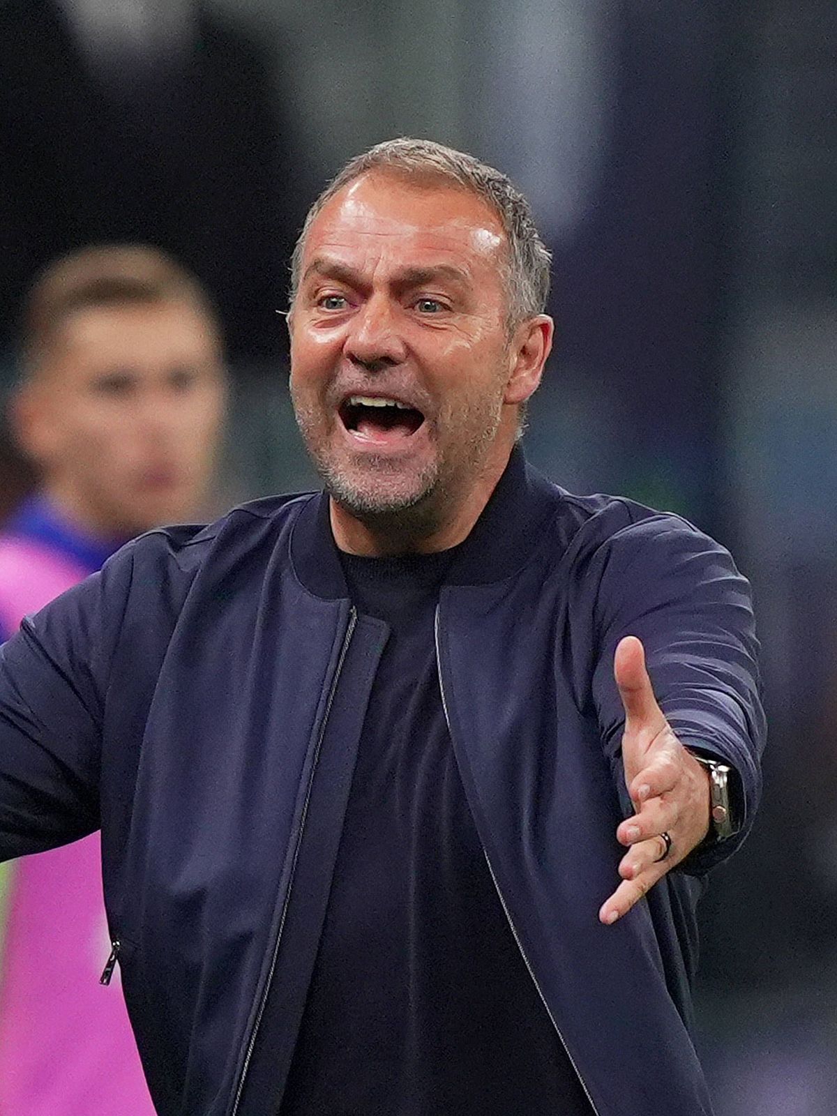 BarcelonaÕs head coach Hansi Flick during the Uefa Champions League soccer match between Inter and Barcelona at San Siro Stadium in Milan , North Italy - Tuesday May 06, 2025 . - Soccer PUBLICATION...