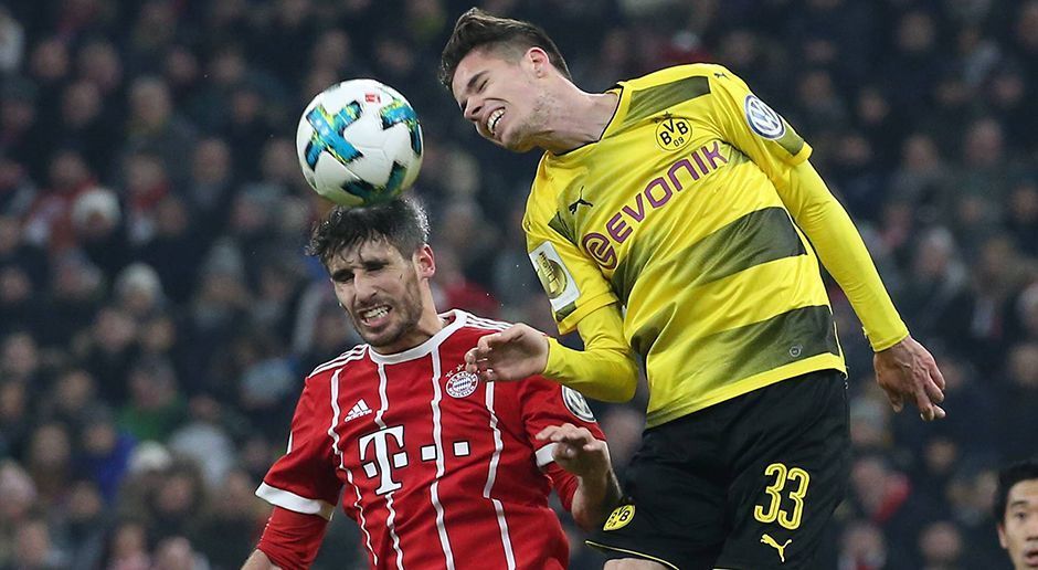 
                <strong>Julian Weigl</strong><br>
                Der ehemalige Münchner Löwe spielt einige gescheite Pässe und ist immer anspielbereit. Aber auch ihm unterlaufen angesichts des Bayern-Drucks ungewohnte Fehler. Während des abschließenden Offensivdrangs des BVB steigert sich auch Weigl. ran-Note: 3
              