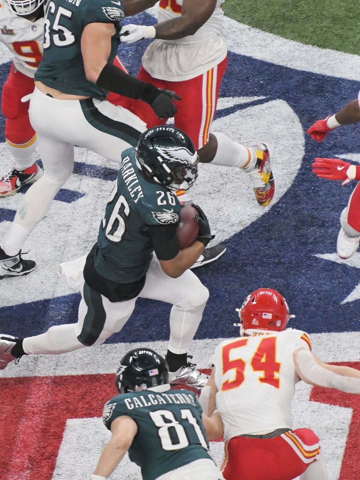 Philadelphia Eagles running back Saquon Barkley (26) rushes up the middle against the Kansas City Chiefs in the third quarter of Super Bowl LIX at Caesars Superdome in New Orleans on Sunday, Februa...
