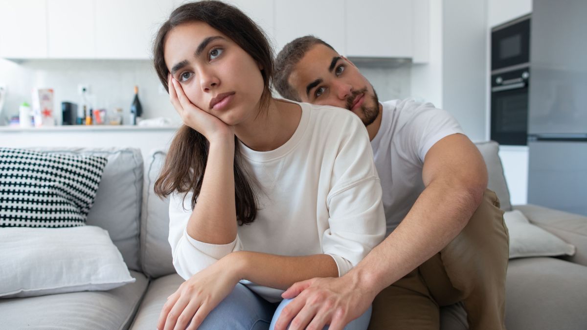 Bored couple watching movie