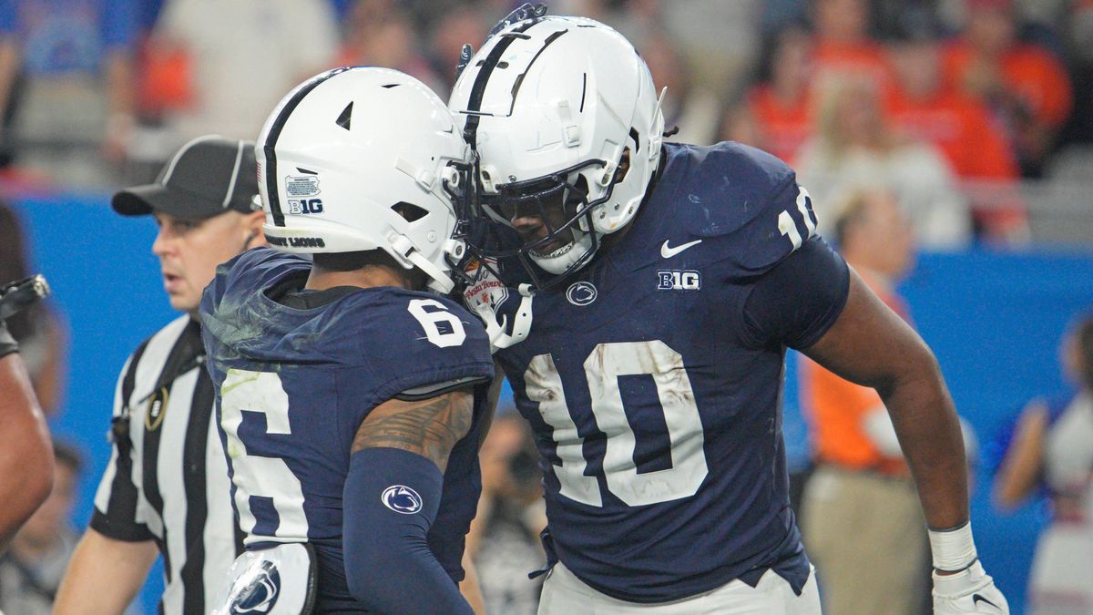 Penn State running back Nicholas Singleton (10) celebrates with wide receiver Harrison Wallace III (6) after scoring on a 58-yard touchdown run against Boise State in the fourth quarter of the Vrbo...