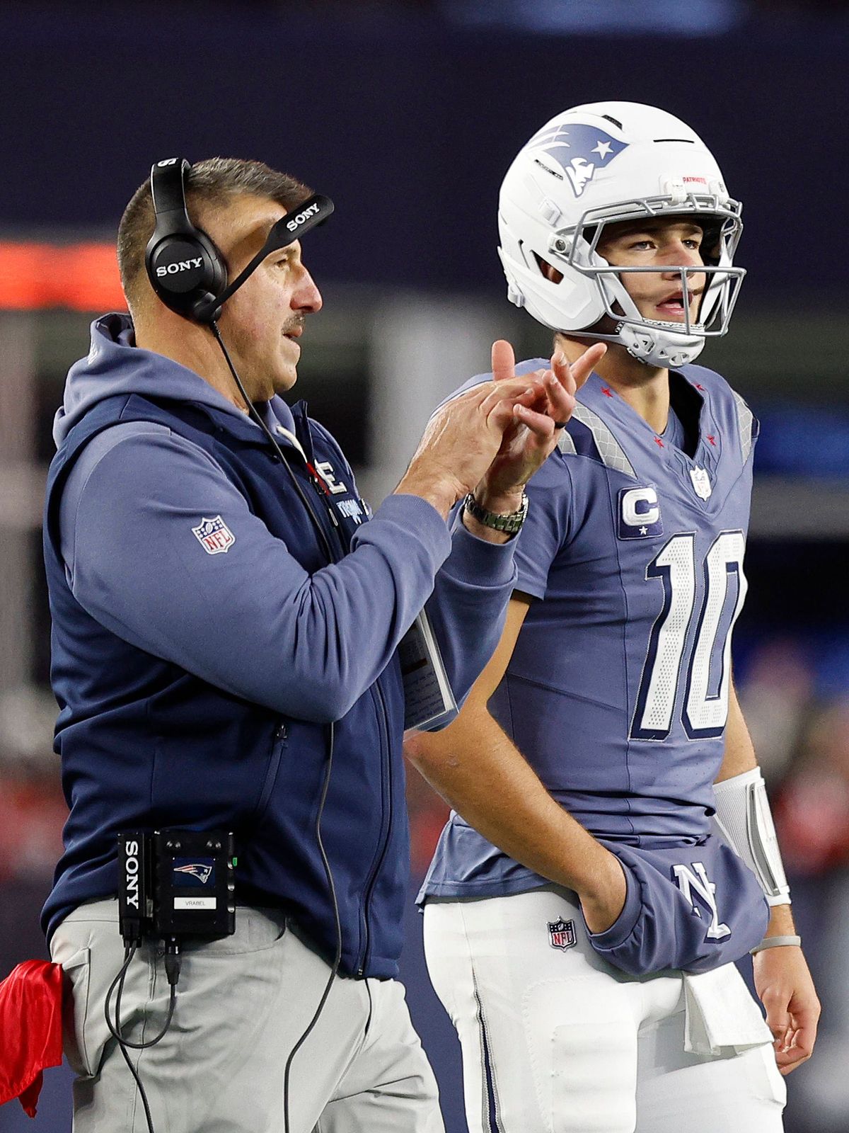 November 13, 2025; Foxborough, MA, USA; New England Patriots head coach Mike Vrabel and New England Patriots quarterback Drake Maye (10) during the NFL, American Football Herren, USA game between N...