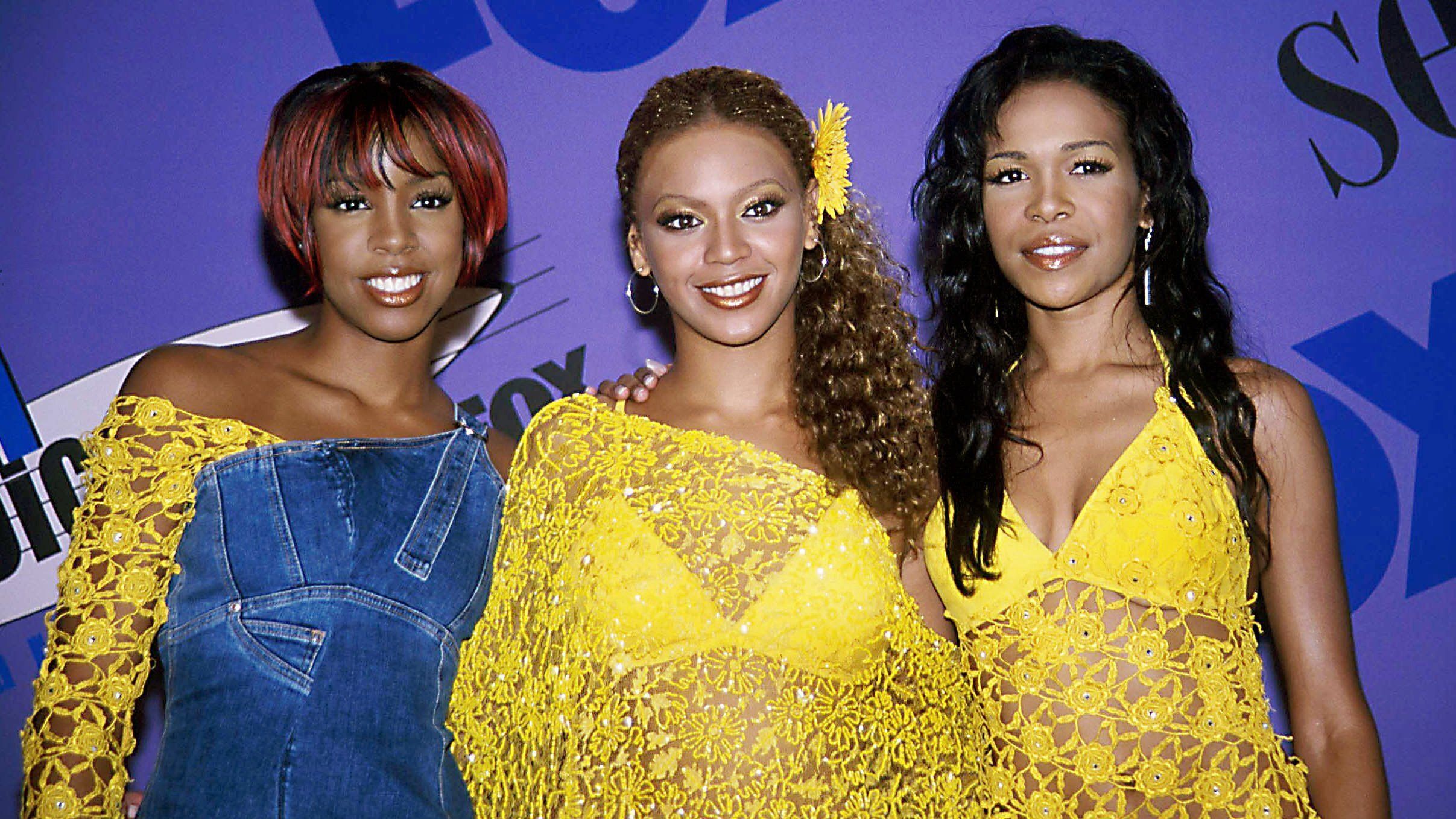 In the early 2000s, Destiny's Child wowed with the lip look.  Here with a little frosty gloss for the perfect Y2K style.