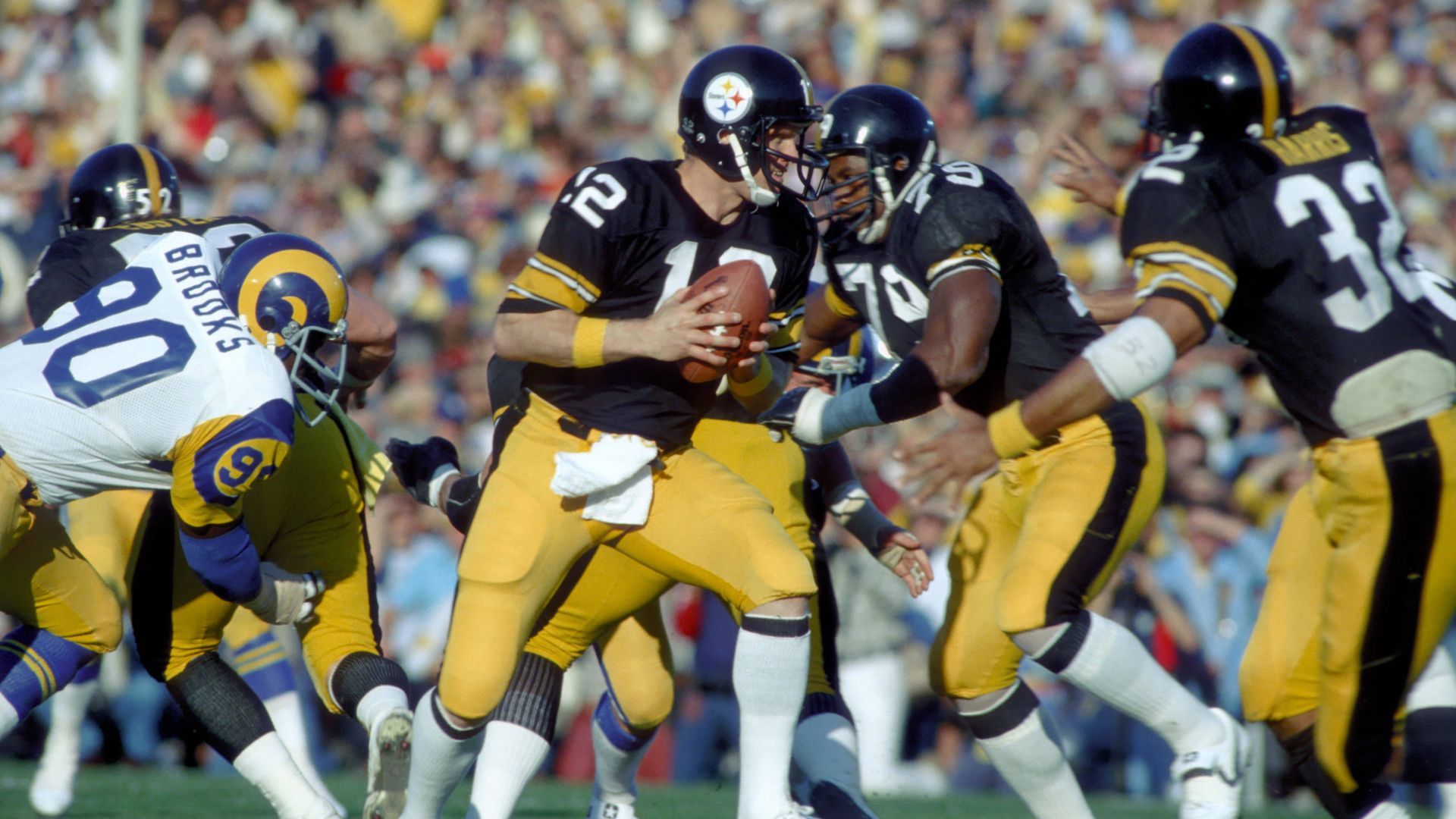 <strong>1980 - Pittsburgh Steelers</strong><br>Endstand: 31:19 gegen die Los Angeles Rams<br>Coach: Chuck Noll<br>MVP: Terry Bradshaw