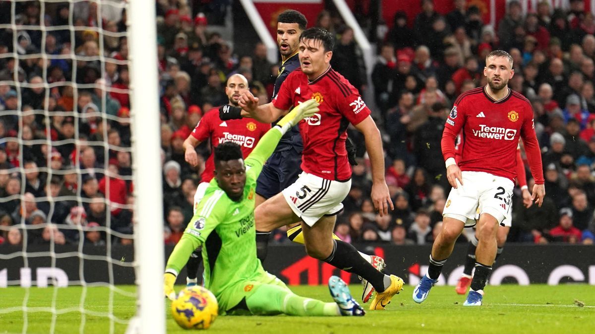 Manchester United, ManU v Bournemouth - Premier League - Old Trafford Bournemouth s Dominic Solanke (centre, hidden) scores their side s first goal of the game during the Premier League match at Ol...