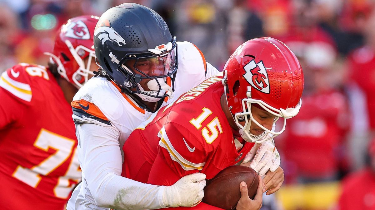 November 10, 2024: Kansas City Chiefs quarterback Patrick Mahomes (15) is sacked by Denver Broncos linebacker Nik Bonitto (15) during the second half at GEHA Field at Arrowhead Stadium in Kansas Ci...