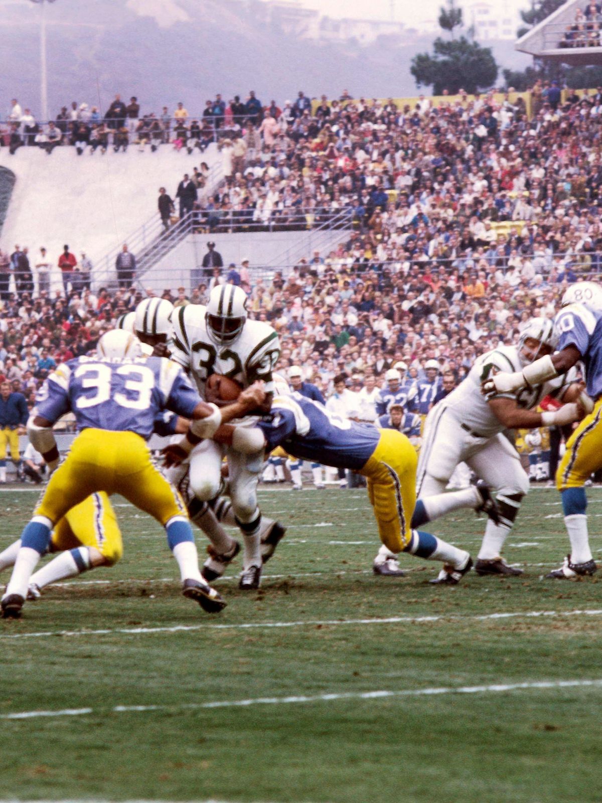US PRESSWIRE Sports Archive Nov 24, 1968; San Diego, CA, USA; FILE PHOTO; New York Jets running back Emerson Boozer (32) carries the ball against the San Diego Chargers at San Diego Stadium. San Di...