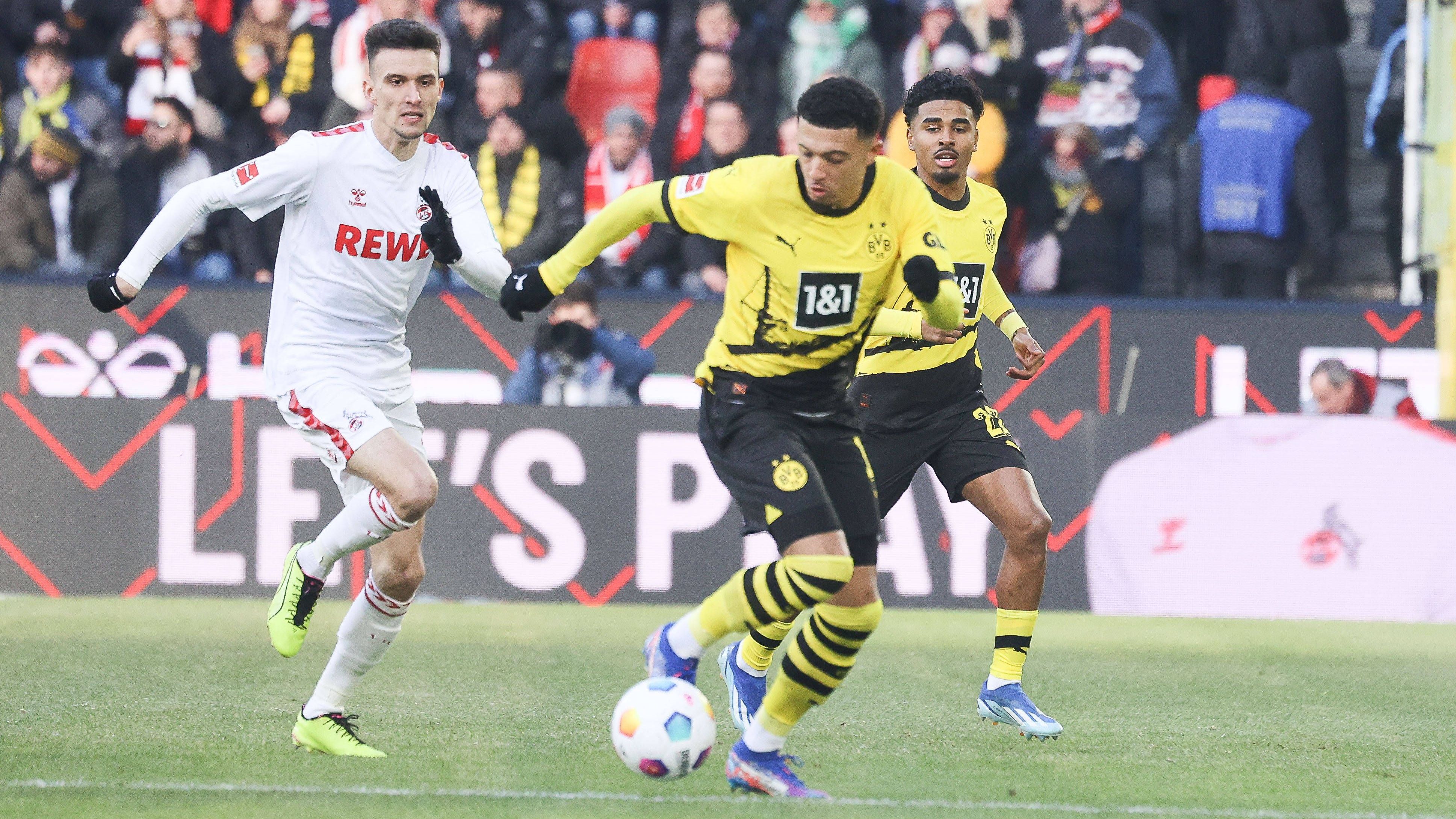 <strong>Jadon Sancho</strong> <br>Der Rückkehrer steht direkt in der Startelf und läuft als linker Außenstürmer im Dortmunder 4-3-3 auf. Der Engländer versucht von Beginn an, die Kölner-Verteidiger auszudribbeln, kriegt dafür nach 20 Minuten ordentlich eine auf die Hölzer getreten. Taucht dann lange ab, bis er in der 2. Halbzeit den Elfmeter rausholt. Insgesamt ein sehr ordentlicher Auftritt. <strong><em>ran</em></strong>-<strong>Note: 2</strong>