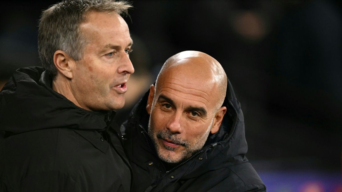 Hjulmand nimmt die Glückwünsche von Guardiola entgegen