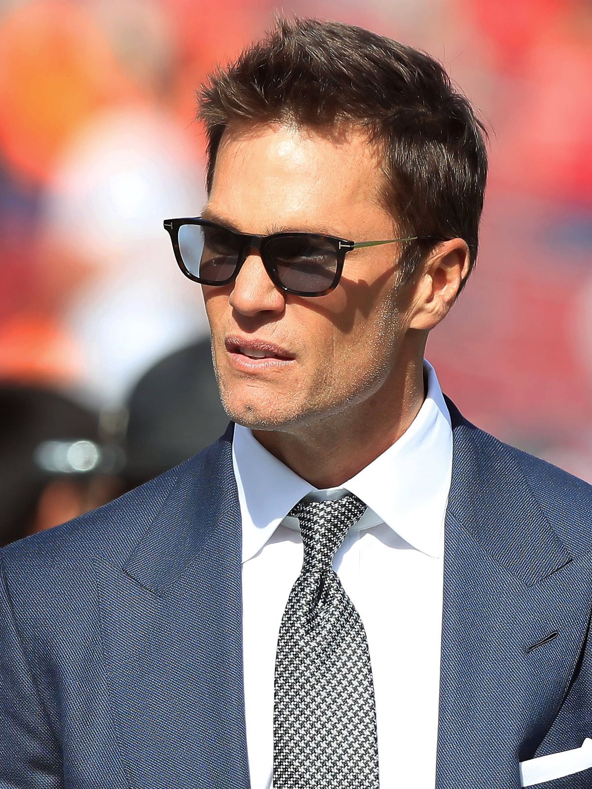 TAMPA, FL - JANUARY 05: Former Tampa Bay Buccaneers Quarterback and Fox NFL, American Football Herren, USA Analyst Tom Brady leaves the field before the game between the New Orleans Saints and the ...