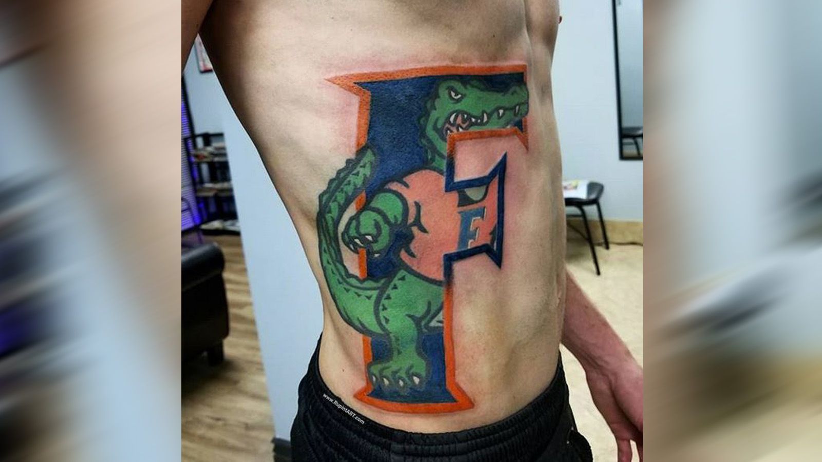 
                <strong>Florida Gators</strong><br>
                Das Krokodil der Florida Gators ziert die Bauchmuskeln dieses Fans.
              