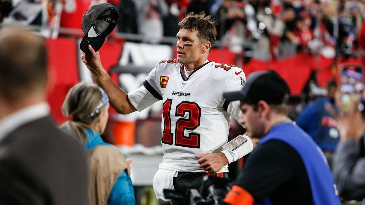 January 16, 2023, Tampa, Florida, USA: Tampa Bay Buccaneers quarterback Tom Brady (12) raises his cap and jogs towards the locker room, after his team is defeated by the Dallas Cowboys at Raymond J...